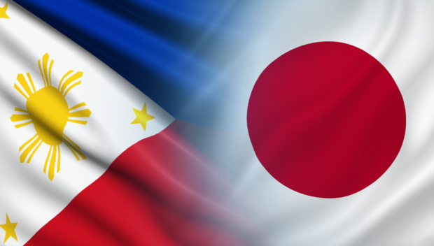 Composite photo merging flags of the Philipines and Japan