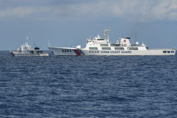 Chinese, Philippine vessels in 'David and Goliath' near-crash
