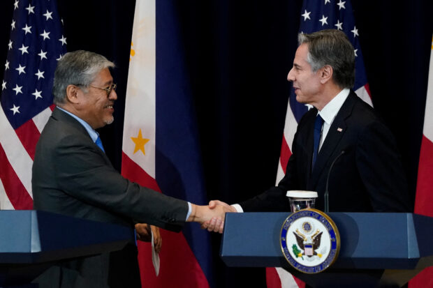 Philippine Secretary of Foreign Affairs Enrique Manalo and U.S. Secretary of State Antony Blinken shake hands at the end of a joint press availability at the State Department in Washington, U.S., April 11, 2023. REUTERS/Elizabeth Frantz