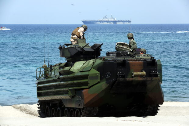 In this photo taken in April 2019, Filipino and American troops storm a beach facing West Philippine Sea in Zambales province during amphibious exercises as part of that year’s “Balikatan” military exercise. Zambales will again host the troops for this year’s drills. STORY: Fishers fear livelihood loss due to ‘Balikatan’