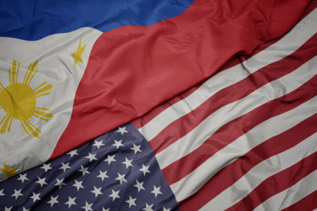 Flags of the Philippines and the United States. STORY: US-PH ties in a ‘very good place now’ – DFA
