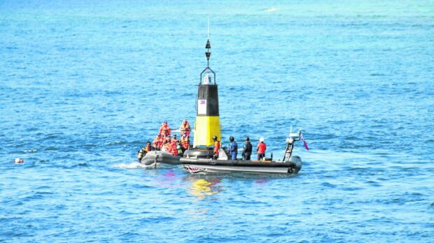 Five 30-foot navigational buoys bearing Philippine flags were installed by the PCG from May 10 to 12, 2023 in the Philippine-occupied islands of Patag (Flat), Kota (Loaita), Panata (Lankiam Cay), and the fishing grounds of Balagtas (Irving) Reef and Julian Felipe (Whitsun) Reef. PHOTO FROM PCG