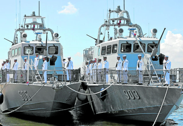 NEW SEA ASSETS Two Fast Attack Interdiction Craft platforms of the Philippine Navy are christened during a ceremony at Naval Station Pascual Ledesma in Cavite Cityon Monday. These new patrol assets from Israel—BRP Gener Tinangag (PG 903) and BRP Domingo Deluana (PG 905)—were named after Philippine Marines Corps heroes. INQUIRER PHOTO / RICHARD A. REYES