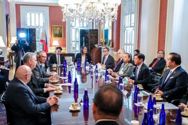 POWER DEAL President Marcos and his delegation meet withthe top executives of NuScale Power Corp. in Washington on the sidelines of his working visit to the United States on Monday. They discussed potential cooperation on energy. —MALACAÑANG PHOTO