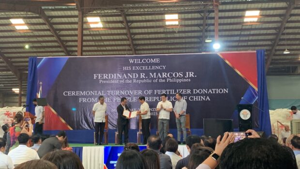 President Ferdinand "Bongbong" Marcos Jr. and Chinese Ambassador to the Philippines at the turnover of 20,000 tons of urea fertilizer on Friday, June 16, 2023. (Photo from Jean Mangaluz)