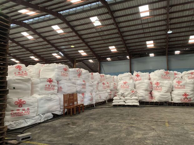 China turns over 20,000 tons of fertilizer to the Philippines, contained in a warehouse in Valenzuela City. (Photo from Jean Mangaluz)