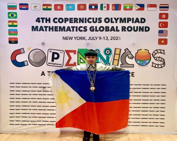 Francis Deinmel Legaspi, a 10-year-old student at the Special Education Center for the Gifted, wins the gold for the Philippines during the 4th Copernicus International Math Olympiad. 