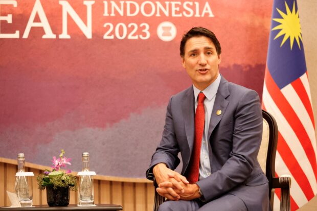Canada's Prime Minister Justin Trudeau talks with Malaysia's Prime Minister Anwar Ibrahim (not pictured) during their bilateral meeting at the 43rd ASEAN Summit in Jakarta, September 6, 2023. (Photo by WILLY KURNIAWAN / POOL / AFP)