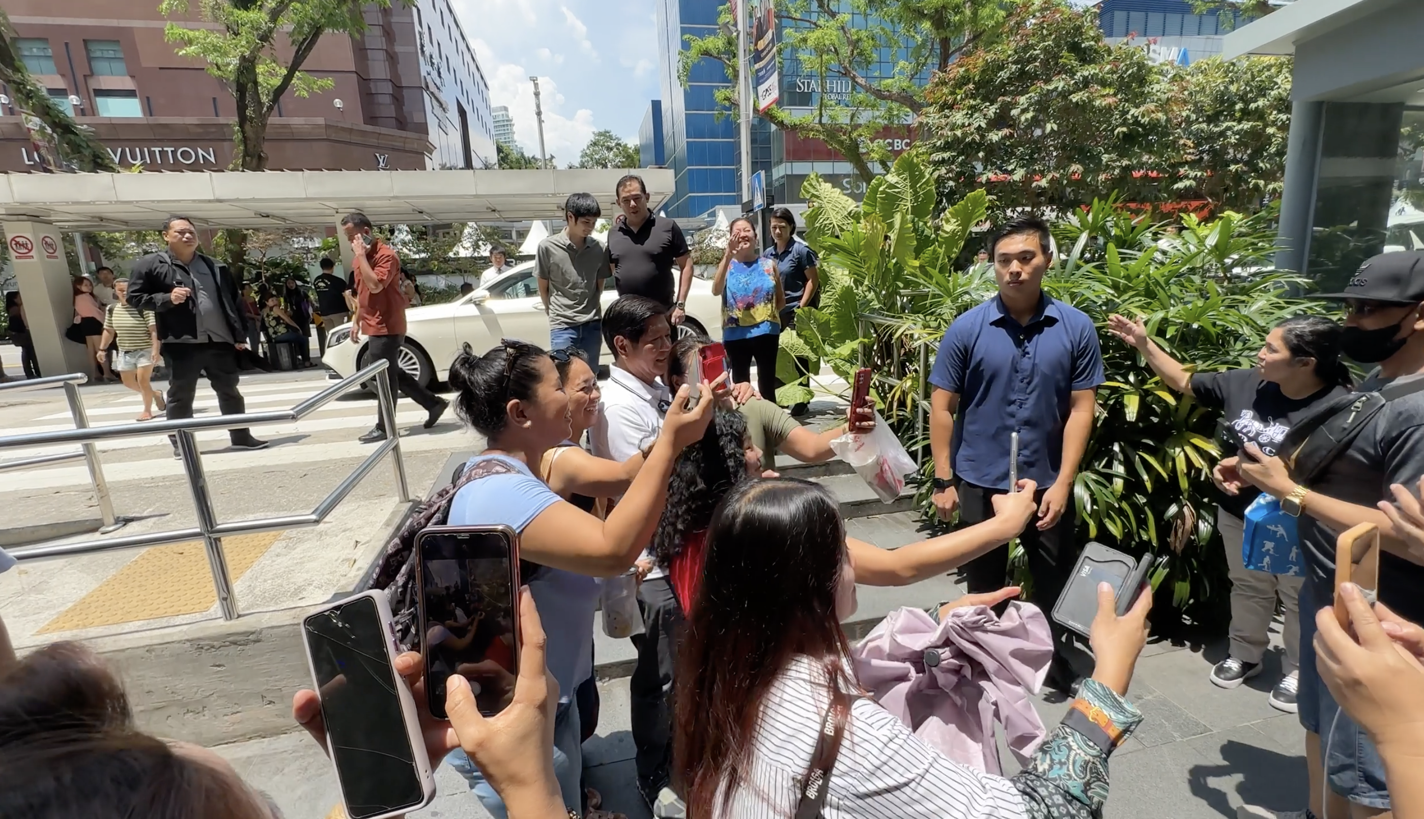 A crowd of Overseas Filipino workers (OFWs) welcomed and swarmed President Ferdinand Marcos Jr. on Sunday after he made a surprise appearance at a mall in Singapore as part of his official visit to the country.