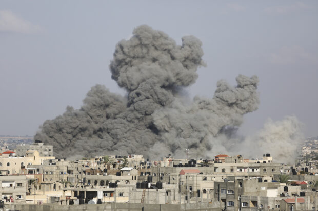 Smoke rises following Israeli airstrikes in Rafah, southern Gaza Strip on Thursday, Oct. 12, 2023.