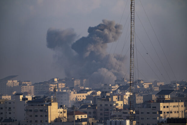 Smoke rises following an Israeli airstrike in Gaza City, Thursday, Oct. 12, 2023. 