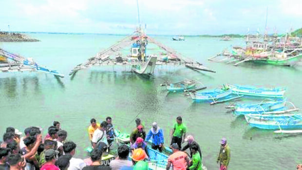 PANATAG TRAGEDY Of the 14 fishermen who wentout to sea aboard the Dearyn early Monday, only 11 returned alive after a foreign vessel rammed it without stopping, says the Philippine Coast Guard (PCG). —PCG PHOTO