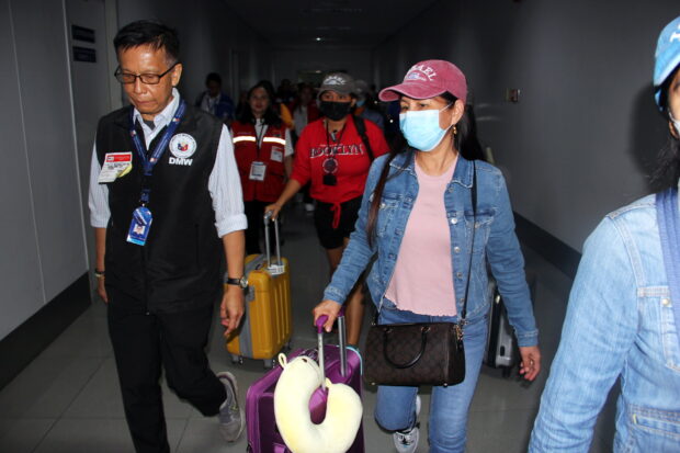 The third batch of returning overseas Filipino workers (OFWs) affected by the escalating Israel-Hamas conflict safely arrived at the Ninoy Aquino International Airport (NAIA) Terminal 3 in Pasay City on Oct. 20, 2023.