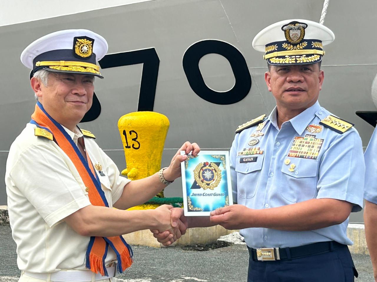 Philippine Coast Guard Commandant Admiral Ronnie Gil Gavan and Japan Coast Guard Commandant Admiral Shohei Ishii. INQUIRER.net/John Eric Mendoza