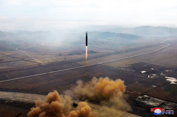 This picture taken on November 18, 2022 and released from North Korea's official Korean Central News Agency (KCNA) on November 19, 2022 shows the launch of a new intercontinental ballistic missile (ICBM) "Hwasong Gun 17", at Pyongyang International Airport. North Korean leader Kim Jong Un said he would respond to US threats with nuclear weapons, state media said on November 19, after Kim personally oversaw Pyongyang's latest launch of intercontinental ballistic missile. (Photo by KCNA VIA KNS / AFP) / South Korea OUT / REPUBLIC OF KOREA OUT---EDITORS NOTE--- RESTRICTED TO EDITORIAL USE - MANDATORY CREDIT "AFP PHOTO/KCNA VIA KNS" - NO MARKETING NO ADVERTISING CAMPAIGNS - DISTRIBUTED AS A SERVICE TO CLIENTS / THIS PICTURE WAS MADE AVAILABLE BY A THIRD PARTY. AFP CAN NOT INDEPENDENTLY VERIFY THE AUTHENTICITY, LOCATION, DATE AND CONTENT OF THIS IMAGE --- /