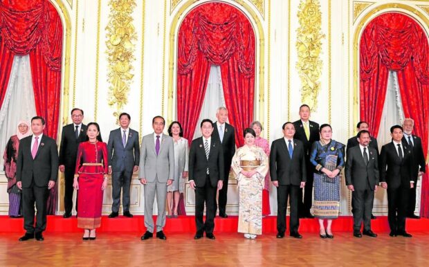  President Marcos and first lady Liza Araneta Marcos pose at the backtogether with the leaders of Malaysia, Singapore, Thailand, Vietnam and East Timor and their spouses in this group photo before their dinner at Akasaka Palace in Tokyo hosted by Japanese Prime Minister Fumio Kishida and his wife Yuko. At the front of this group, together with the Kishidas, are the leaders of Cambodia, Indonesia, Laos and Brunei, some of them together with their spouses. 