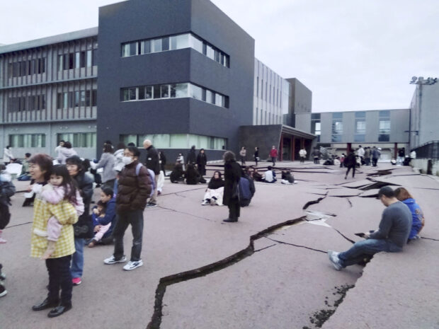 Road cracks caused by an earthquake is seen in Wajima, Ishikawa prefecture, Japan January 1, 2024, in this photo released by Kyodo. Mandatory credit Kyodo via REUTERS