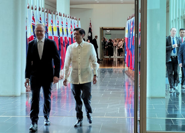 Australian Prime Minister Anthony Albanese walks with Philippine President Ferdinand Marcos Jr at the Parliament House in Canberra, Australia