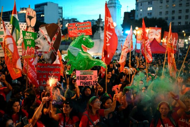 Demonstrators shout slogans during a march to mark the International Women's Day in Buenos Aires
