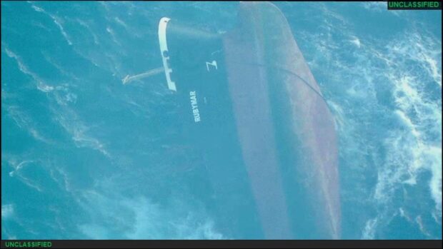 A handout picture released by the US Central Command (CENTCOM) on March 2, 2024 shows the capsized Belize-flagged UK-owned bulk carrier Rubymar in the Red Sea, after taking damage due to a February 18 missile strike claimed by Yemen's Huthi group. The sinking of a Belize-flagged bulker off Yemen after a Huthi missile attack poses grave environmental risks, with fuel leaks and fertilizer cargo pouring into the Red Sea, according to officials and experts.AFP Add to cart Print Download Related documents Share this document Full size|1024 px|512 px Mockup (1024 px)