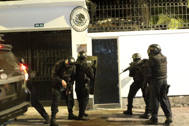 Picture released by API showing Ecuadorian police special forces attempting to break into the Mexican embassy in Quito to arrest Ecuador's former Vice President Jorge Glas, on April 5, 2024. Mexican President Andres Manuel Lopez Obrador ordered on April 5, 2024 the "suspension" of relations with Ecuador after Ecuadorian police raided the Mexican embassy in Quito to arrest former vice president Jorge Glas, who had received refuge.