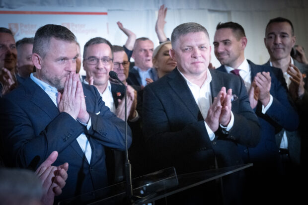 Presidential candidate Peter Pellegrini (L) and Slovak Prime Minister Robert Fico (R) speak to journalists after the announcement of Pellegrini's victory in the second round of the Slovak presidential elections, April 6, 2024 in Bratislava, Slovakia.VLADIMIR SIMICEK / AFP