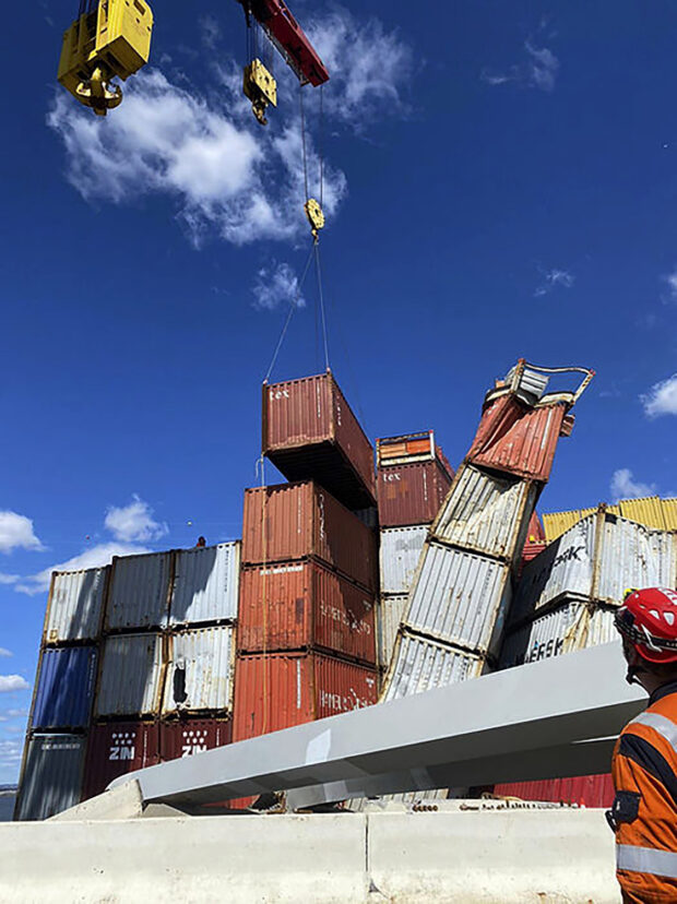 Salvage crews remove containers from ship that collapsed Baltimore's bridge