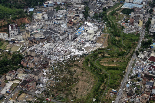 Aerial photos show wide devastation left by tornado in Guangzhou