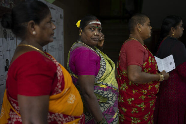 Women queue up to cast their votes