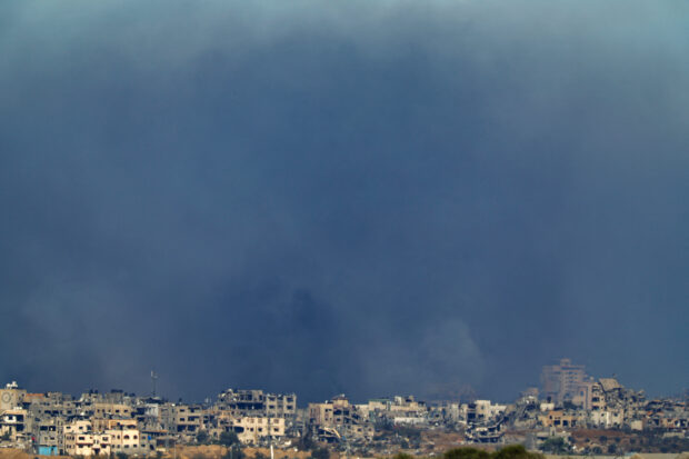 Smoke engulfs Gaza skyline, amid the ongoing conflict between Israel and the Palestinian Islamist group Hamas, as seen from Southern Israel