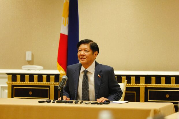 President Ferdinand Marcos Jr. walks toward a room in a Washington D. C. hotel, for a press briefing with members of the Philippine media delegation on April 12, 2024. Marcos addressed questions about the alleged gentleman’s agreement between China and former president Rodrigo Duterte, which he called a secret deal, during the press conference. Gabriel P. Lalu/ INQUIRER.net deal china
