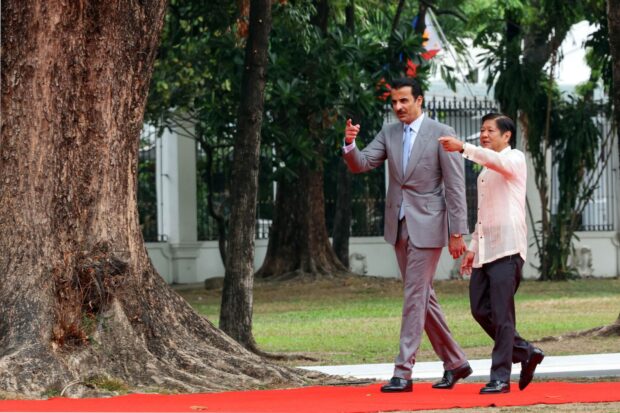 Qatar’s Amir Sheik Tanim bin Hamad Al-Thani with President Ferdinand R. Marcos Jr. during a welcome ceremony at the Kalayaan grounds of Malacañang complex in Manila on Monday, April 22, 2024. | PHOTO: KJ ROSALES/PPA POOL