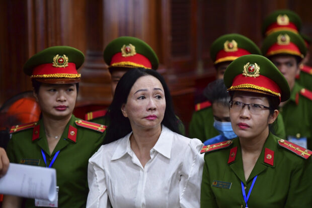 Business woman Truong My Lan, front center, attends a trial in Ho Chi Minh City, Vietnam