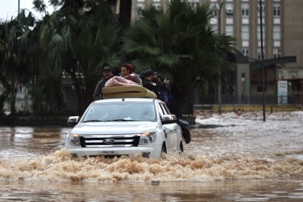 Homeless people are rescued in the Historic Center of Porto Alegre, Rio da Grande do State, Brazil on May 4, 2024. The floods caused by the intense rains that hit southern Brazil left at least 56 dead and 67 missing, according to a new report on Saturday from Civil Defense.