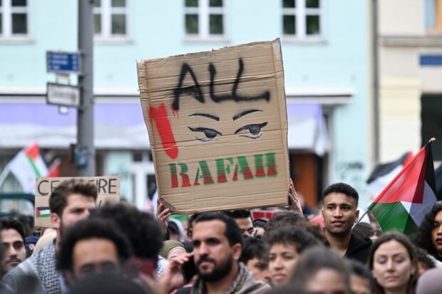 A participant holds up a placard reading 'All (eyes on) Rafah' during a pro-Palestinian protest to mark the 'Nakba' anniversary, at Oranienplatz square in Berlin, Germany on May 18, 2024.