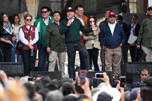Colombia's President Gustavo Petro (C) delivers a speech during a May Day (Labor Day) rally in Bogota on May 1, 2024.