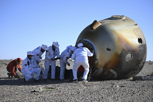 China astronauts return to Earth after 6 months on space station