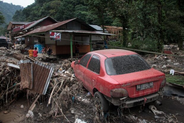 A damaged area is seen after flash floods and cold lava flow from a volcano in Tanah Datar, West Sumatra, on May 12, 2024.
