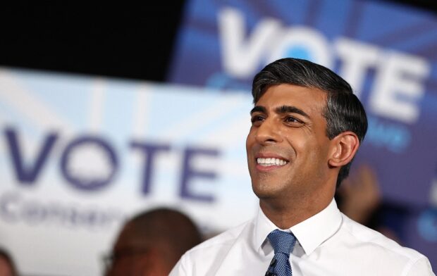 Britain's Prime Minister and leader of the Conservative party, Rishi Sunak speaks during a general election campaign event at the ExCeL in east London, on May 22, 2024. 