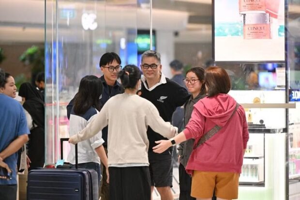 SIA relief flight with passengers and crew members of SQ321 arrives in Singapore