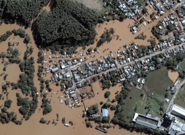 This handout satellite image courtesy of Maxar Technologies taken on May 7, 2024 shows the Taquari river after floodings in Taquari, Rio Grande do Sul state, Brazil.