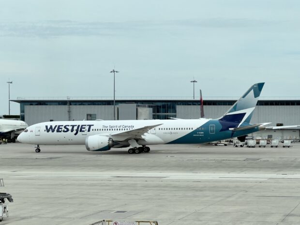 A Canadian Westjet airlines Boeing 787 Dreamliner plane taxis at Paris Charles de Gaule international airport (CDG) on September 17, 2023. (Photo by Daniel SLIM / AFP)