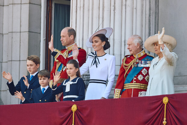 (L-R) Britain's Prince George of Wales, Britain's Prince William, Prince of Wales, Britain's Prince Louis of Wales, Britain's Princess Charlotte of Wales, Britain's Catherine, Princess of Wales, Britain's King Charles III and Britain's Queen Camilla wave on the balcony of Buckingham Palace after attending the King's Birthday Parade "Trooping the Colour" in London on June 15, 2024. The ceremony of Trooping the Colour is believed to have first been performed during the reign of King Charles II. Since 1748, the Trooping of the Colour has marked the official birthday of the British Sovereign. Over 1500 parading soldiers and almost 300 horses take part in the event. (Photo by BENJAMIN CREMEL / AFP)
