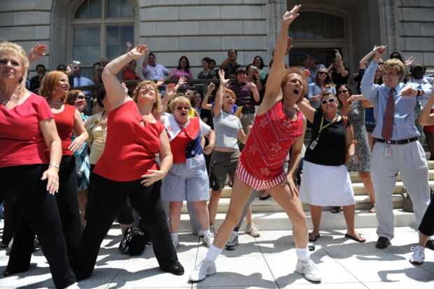 Fitness advocate Richard Simmons, wearing his signature shorts and tanktop, leads Capitol Hill staff and visitors through an exercise routine in this July 24, 2008 file photo in Washington, DC. Americans' expanding girths are driving down the number of years they live in good health, a study published August 3, 2010 said. As the percentage of obese adults in the United States shot up by 90 percent in 16 years, from 14 percent in 1993 to 27 percent two years ago, the number of quality-adjusted life years lost because of obesity more than doubled, said the study published in the American Journal of Preventive Medicine.