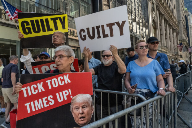 Crowds gather in front of Trump Tower prior to a press conference by former U.S. President Donald Trump on May 31, 2024 in New York City. A New York jury found Trump guilty Thursday of all 34 charges of covering up a $130,000 hush money payment to adult film star Stormy Daniels to keep her story of their alleged affair from being published during the 2016 presidential election. Trump is the first former U.S. president to be convicted of crimes.