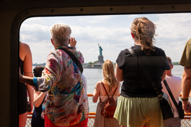 People ride the Staten Island Ferry on a warm late spring afternoon on June 03, 2024 in New York City. As temperatures around the world continue to break yearly heat records, New York City is planning ahe