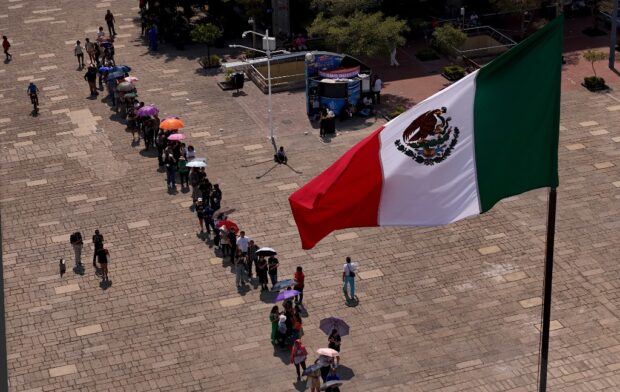 In this aerial view people queue to vote at a polling station in the Cabañas Cultural Center during the general election in Guadalajara, Jalisco state, Mexico, on June 2, 2024. 