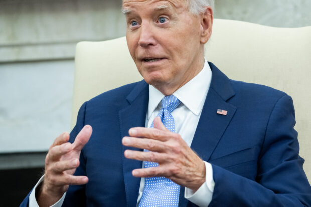 US President Joe Biden speaks as he hosts a bilateral meeting with British Prime Minister Keir Starmer (out of frame) in the Oval Office of the White House in Washington, DC, on July 10, 2024. 