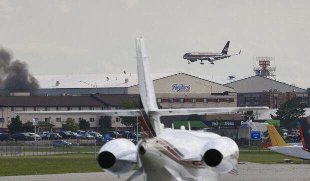 Former US president and Republican presidential candidate Donald Trump's plane lands at Milwaukee Mitchell International Airport, Wisconsin, on July 14, 2024, one day after an apparent assassination attempt at a rally in Pennsylvania. Former US president Donald Trump landed in Milwaukee on July 14 for the Republican National Convention