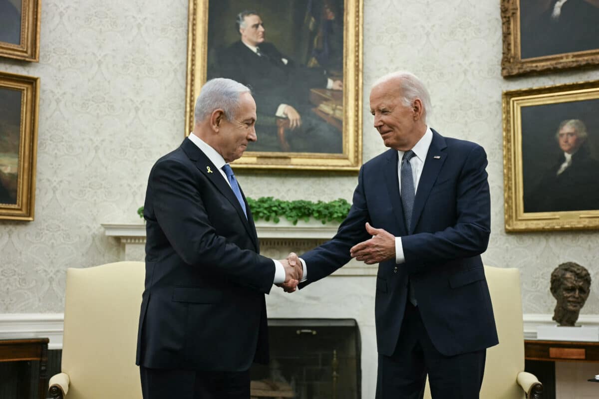 US President Joe Biden (R) shakes hands with Israeli Prime Minister Benjamin Netanyahu during a meeting in the Oval Office of the White House in Washington, DC, on July 25, 2024.